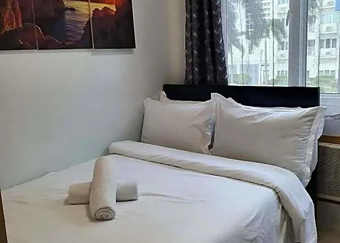 Отель Vangie's Place At Sea Residences 4*