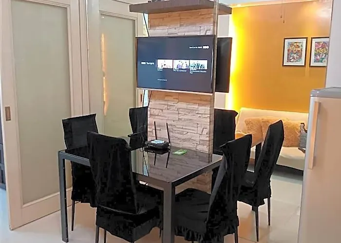 Vangie's Place At Sea Residences Отель