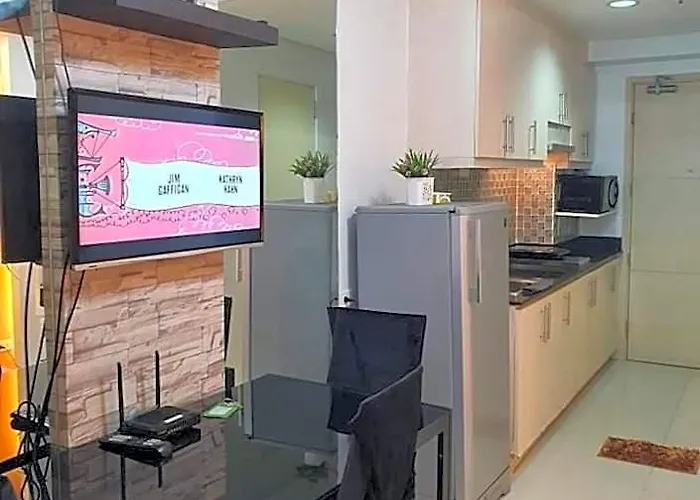 Отель Vangie's Place At Sea Residences