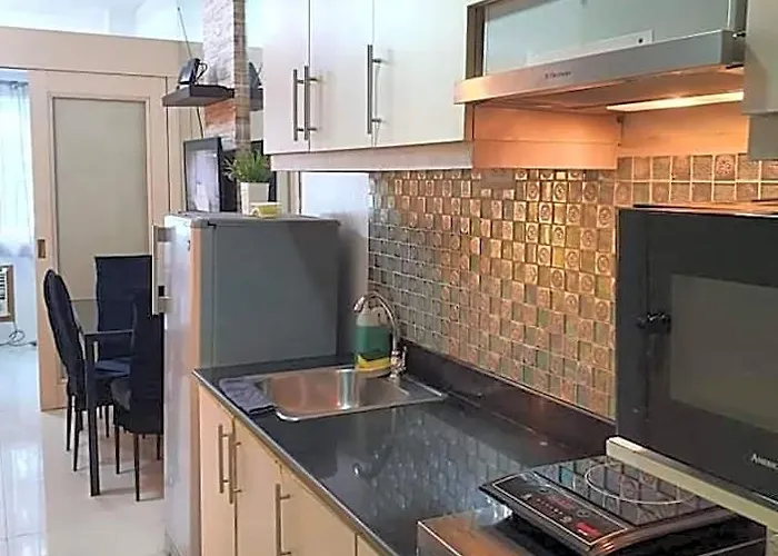 Отель Vangie's Place At Sea Residences 4*